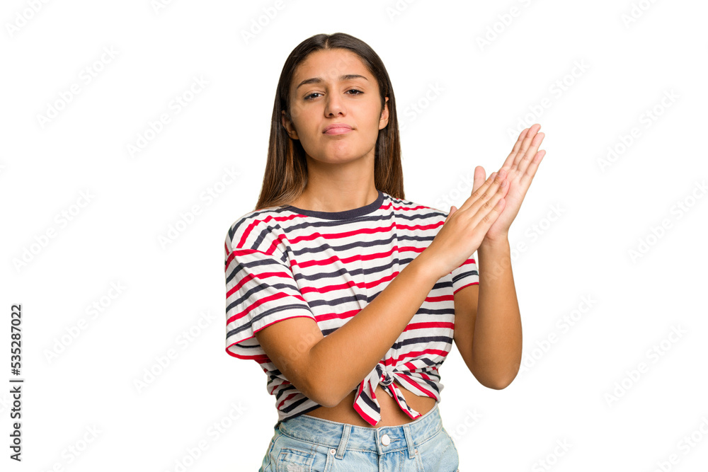 Young Indian woman isolated cutout removal background feeling energetic and comfortable, rubbing hands confident. Young Indian woman isolated cutout removal background feeling energetic and comfortable, rubbing hands confident.