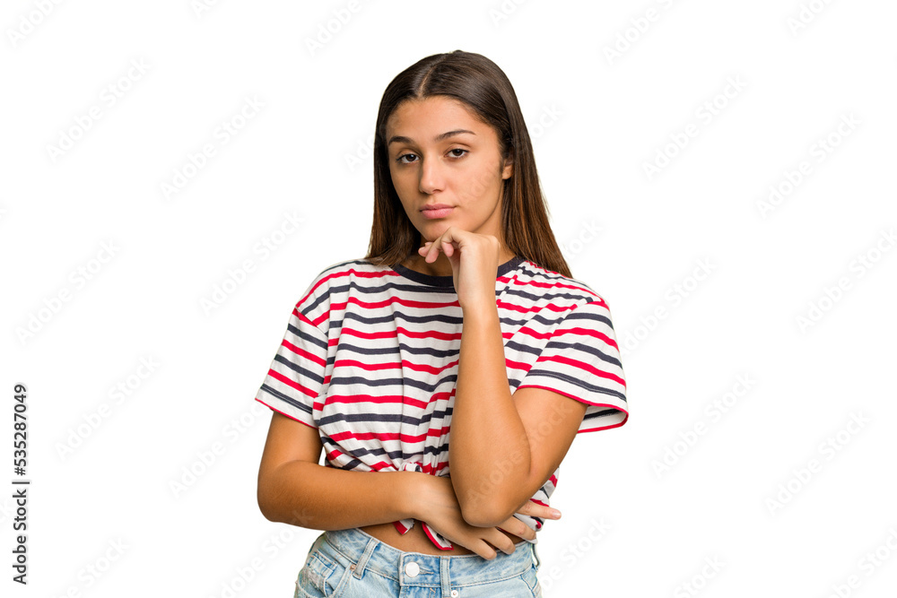 Young Indian woman isolated cutout removal background suspicious, uncertain, examining you. Young Indian woman isolated cutout removal background suspicious, uncertain, examining you.