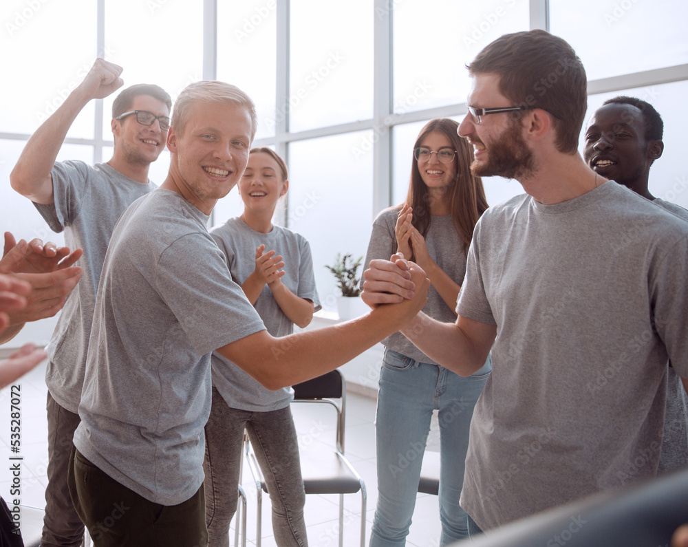 two leaders standing in the circle of the contact group Stock Photo ...