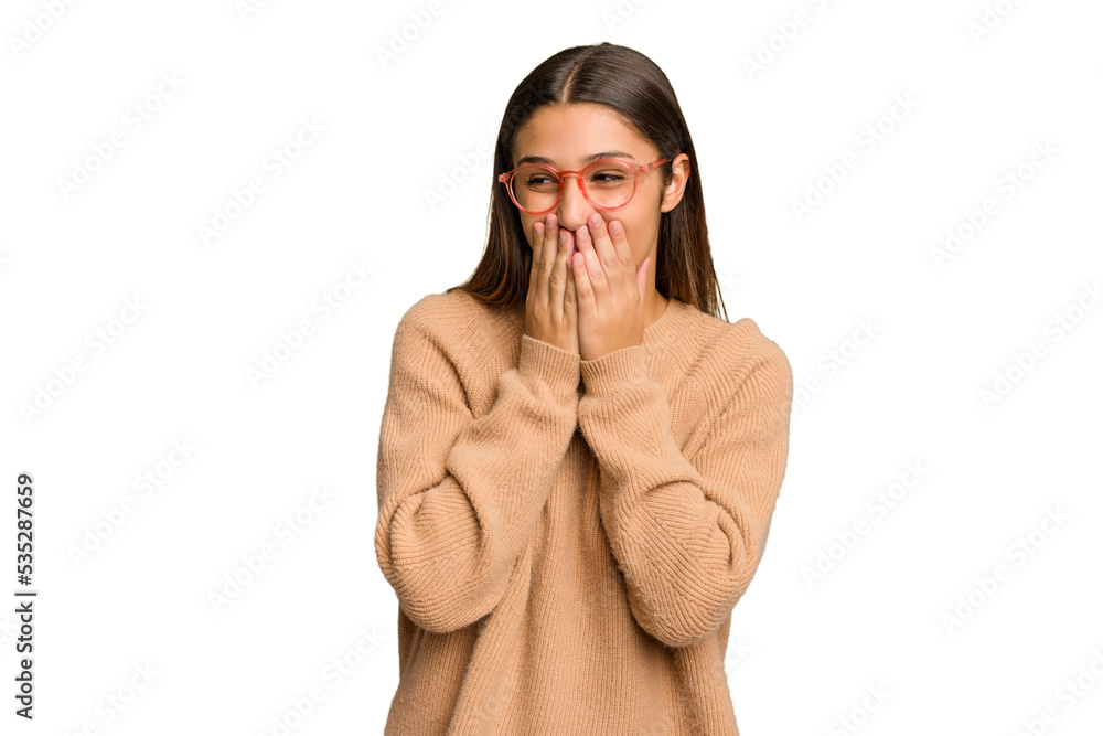 Young Indian woman isolated cutout removal background laughing about something, covering mouth with hands. Young Indian woman isolated cutout removal background laughing about something, covering mouth with hands.