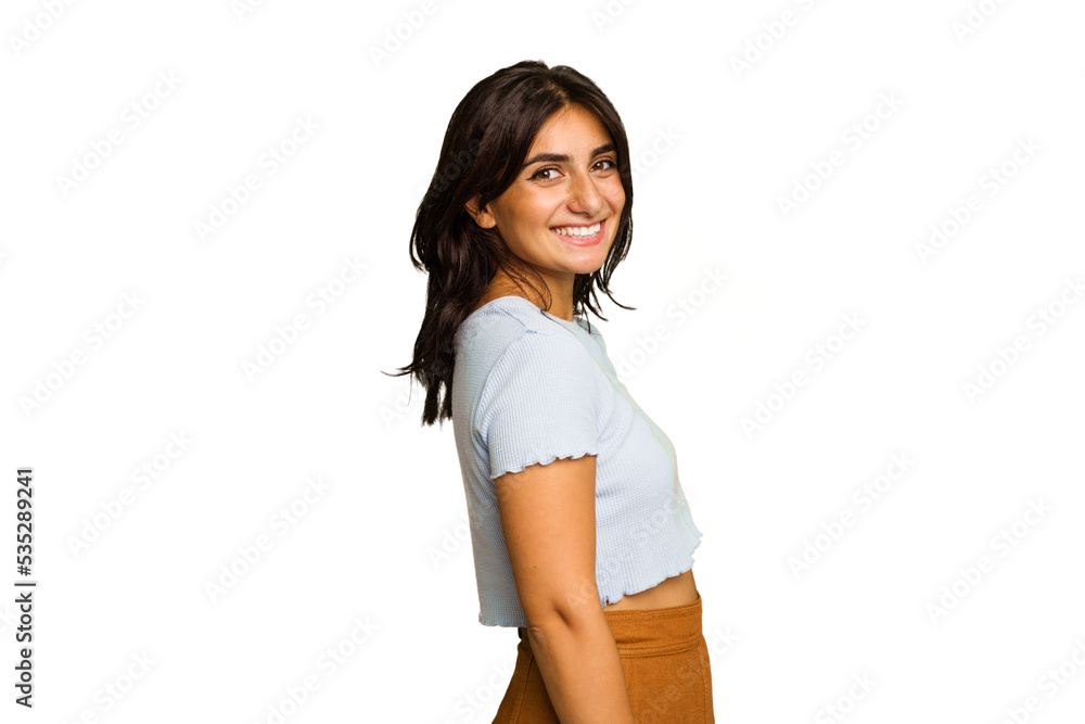 Young Indian woman isolated on green chroma background confident keeping hands on hips.