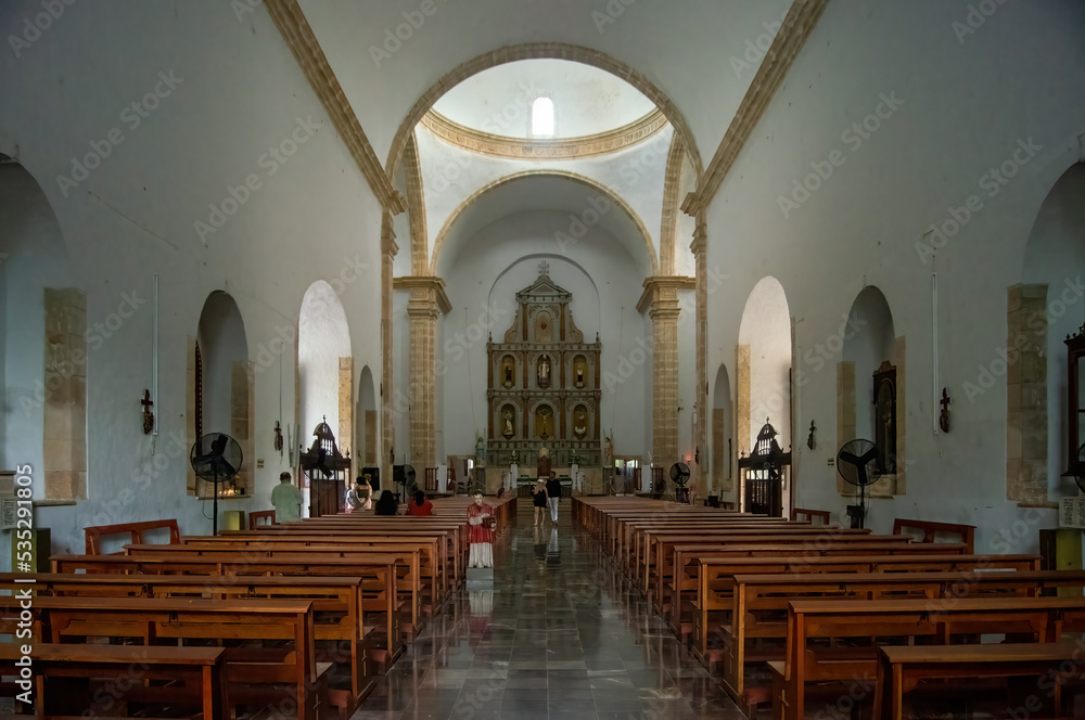 Interior view of a modern church with empty pews