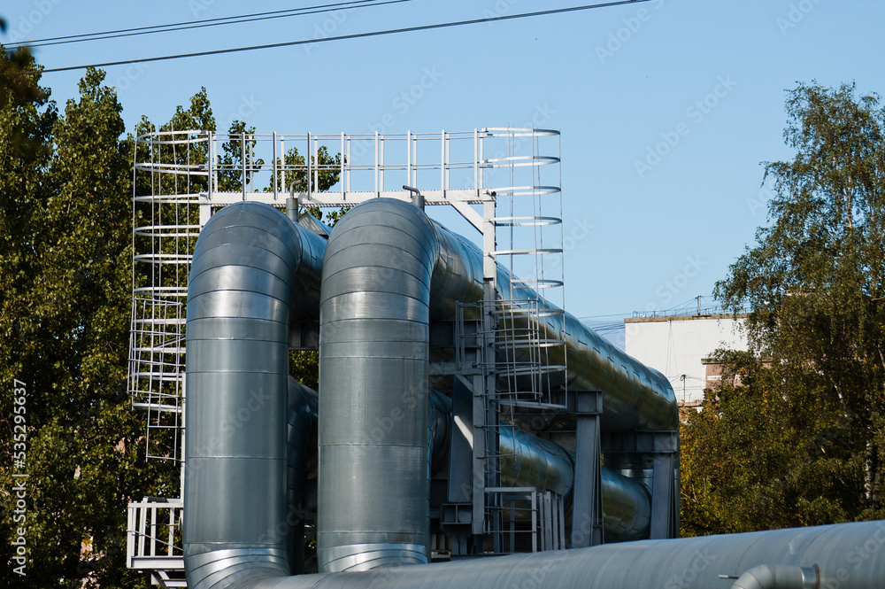 Fototapeta premium pipeline , pictured pipelines against a background of blue sky and trees