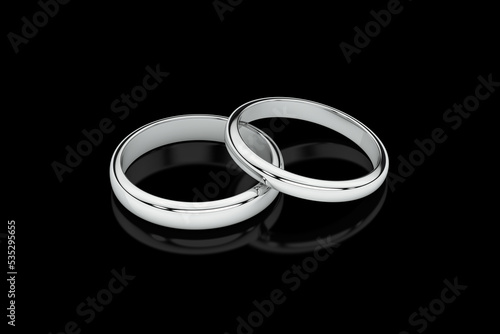 Jewelry wedding band white gold rings on glossy black background. 3D rendering