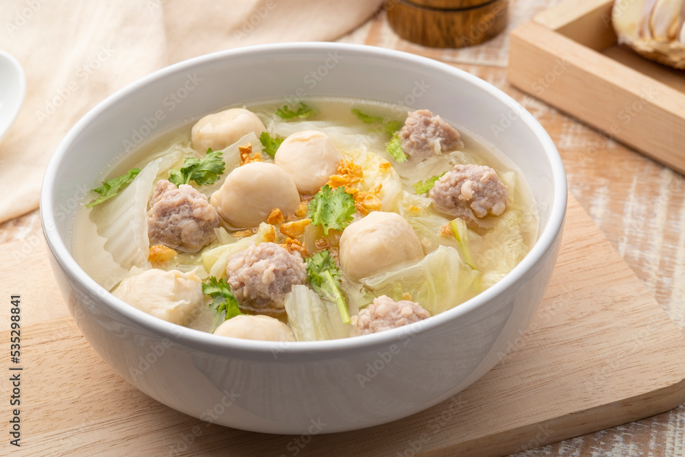 Chinese Cabbage Soup with Minced Pork and meatball in white bowl.Thai style clear soup Chinese Cabbage Soup with Minced Pork and meatball in white bowl.Thai style clear soup