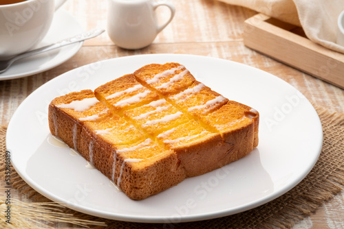Quadro em tela Air fryer grilled butter toast,golden brown crispy bread topped with sugar and s