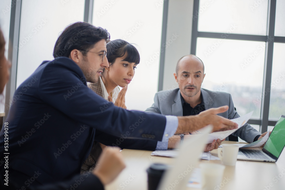 Business people working in conference room Business people working in conference room