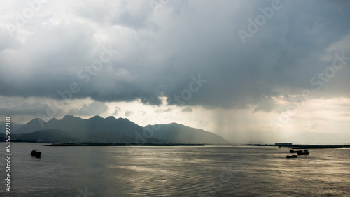 Overcast morning on lake with boats