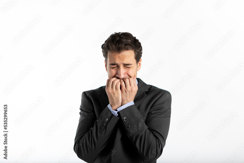 Depressed and frustrated businessman crying isolated on white background Depressed and frustrated businessman crying isolated on white background