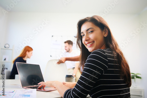 Attractive Business woman in the office © FotoArtist