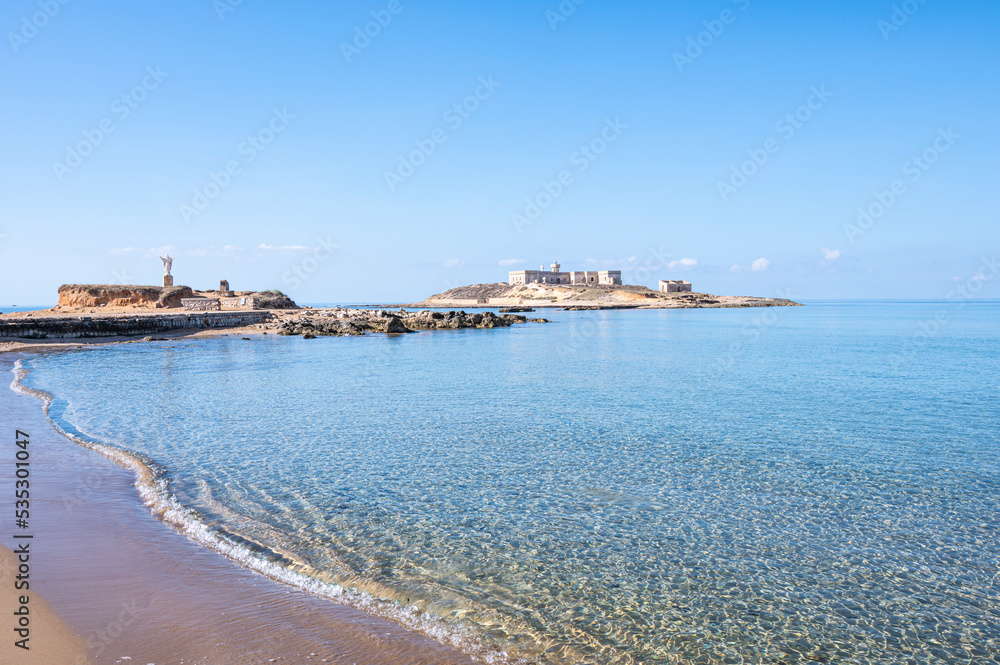 The beautiful Beach of Correnti with transparent and blue water in Portopalo in Sicily