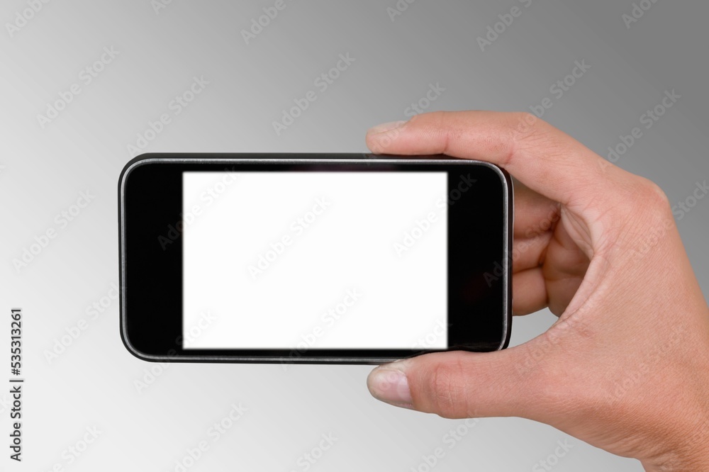 Hand holding smartphone with blank screen for Infographic Global Business web site design app Hand holding smartphone with blank screen for Infographic Global Business web site design app