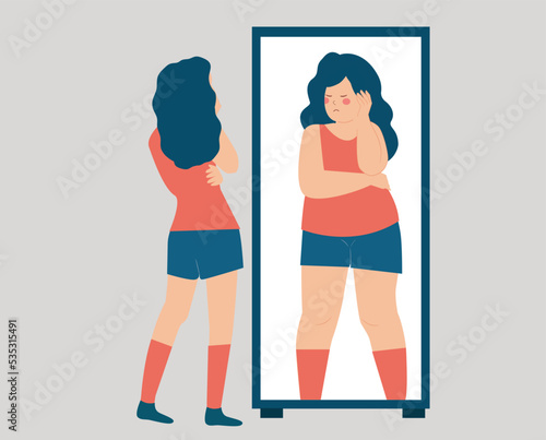 Slim girl has low self confidence and esteem, Anorexia Disorder. Skinny woman looking at the mirror seeing herself as fat. Influence of unhealthy or food Nutrition on the body. Mental disorder concept