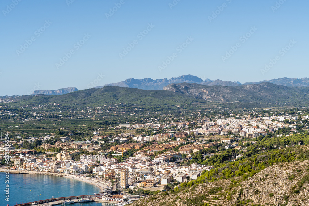 Aerial view of Jávea and its bay, on a sunny day