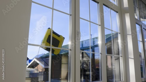 Modern window cleaning appliances work independently from the outside of the house. Automatic window washer moves along a given trajectory while working on the window