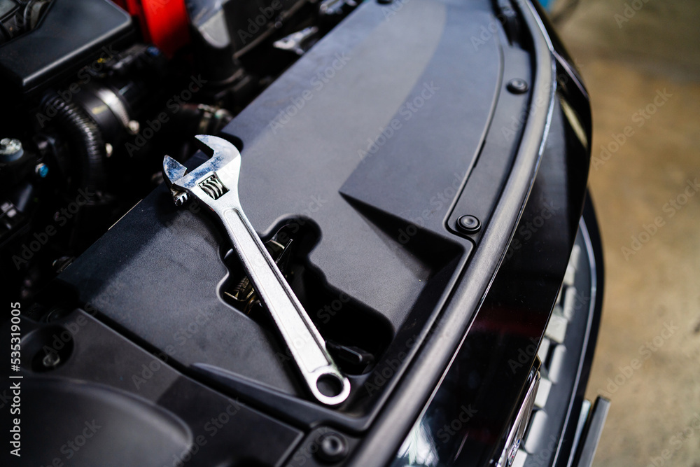 car engine wrench Car service concept. Auto Repair Auto Engine Repair Hand, Auto Engine Repair Workshop with Wrench, Auto Service and Maintenance. Professional technician. repair shop car engine wrench Car service concept. Auto Repair Auto Engine Repair Hand, Auto Engine Repair Workshop with Wrench, Auto Service and Maintenance. Professional technician. repair shop