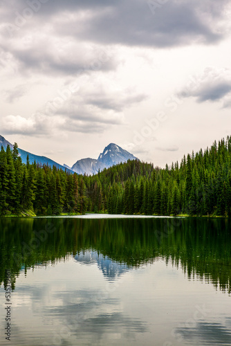 A mountain reflecting in the Moose Lake near Maligne Lake in Jasper National Park