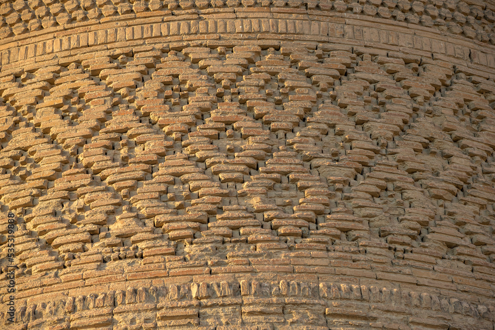 A fragment of the ancient minaret of the Poi-Kalyan madrasah. Bukhara, Uzbekistan A fragment of the ancient minaret of the Poi-Kalyan madrasah. Bukhara, Uzbekistan