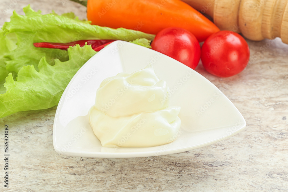 Organic mayonnaise sauce in the bowl Organic mayonnaise sauce in the bowl