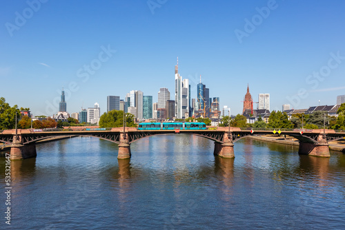 Frankfurt skyline with Main river and tram on Ignatz Bubis Bridge travel traveling in Germany photo
