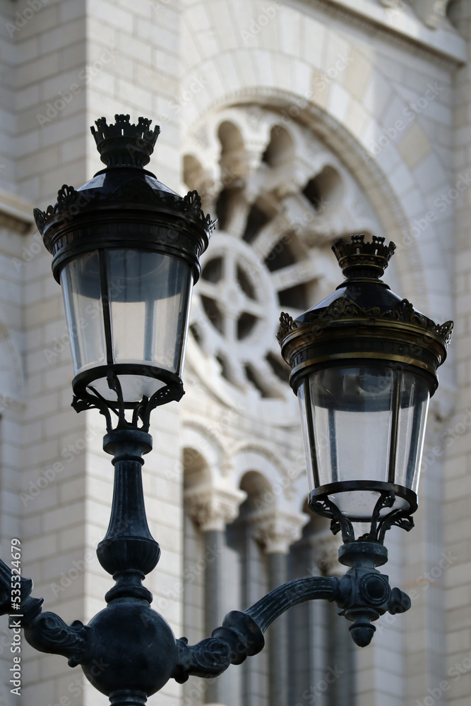Monaco, Monaco - 02.10.2022: A streetlight in front of the Saint-Nicolas Cathedral in Monaco