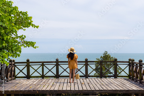 Fototapeta Naklejka Na Ścianę i Meble -  Travel woman look at the sea in Kinmen of Taiwan