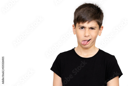 Boy sticking out his tongue on white background