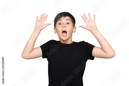 Little boy asian kid wearing casual black tshirt scared and amazed with open mouth for surprise, disbelief face