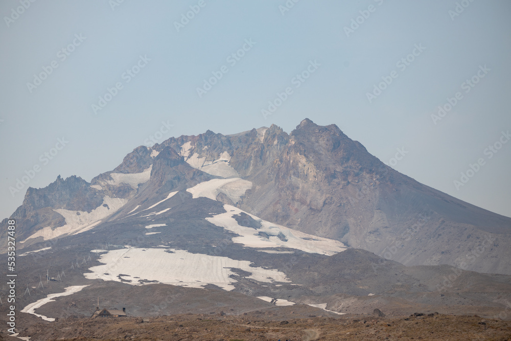 Summit of the Snow-Capped Mount Hood in Oregon on a Hazy Summer Day with Wildfire Smoke
