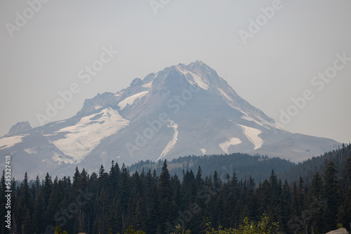 Summit of the Snow-Capped Mount Hood in Oregon on a Hazy Summer Day with Wildfire Smoke