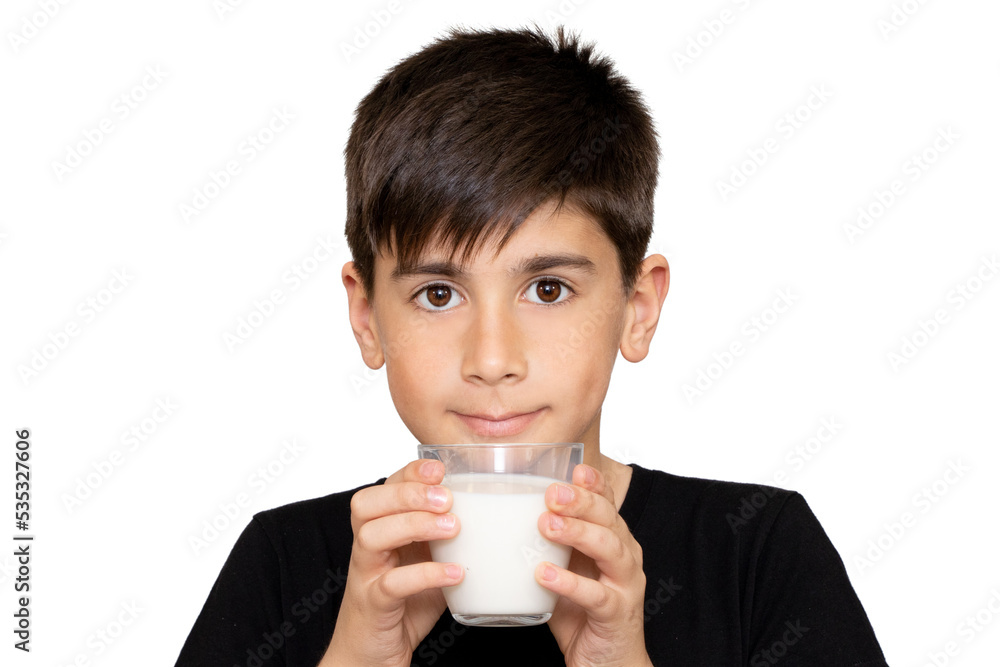 Photo of adorable young happy boy looking at camera.Cute kid drinking milk on white background Photo of adorable young happy boy looking at camera.Cute kid drinking milk on white background