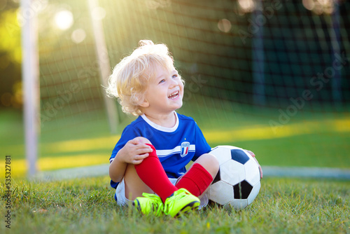 France football fan kids. Children play soccer. © famveldman