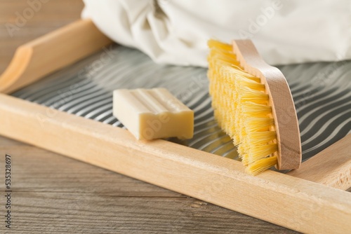 Bilde på lerret Close up of wood and metal washboard or wash board with brush, piece of washing
