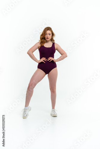 model size posing bodysuit on white background