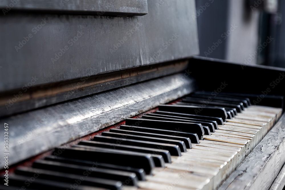 broken black and white keys on ruined piano keyboard close up selective focus broken black and white keys on ruined piano keyboard close up selective focus