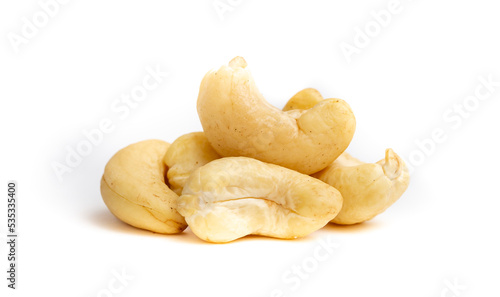 Cashew nuts as a background, top view. Cashew isolated on white background. Healthy foods.