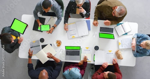 Technology green screen web design meeting from above with planning, collaboration and diversity business success. Digital tablet, phone and laptop for UX marketing agency teamwork management project