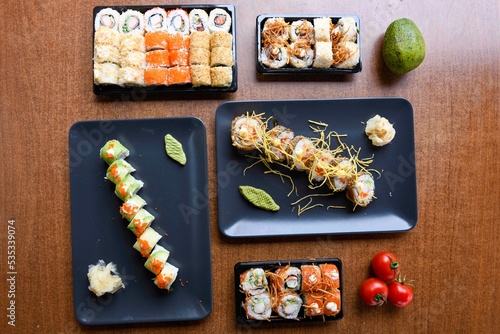 Table scene of assorted take out or delivery foods. Traditional Turkish cuisine. Various Turkish meal and appetizers. Top down view on a table. photo