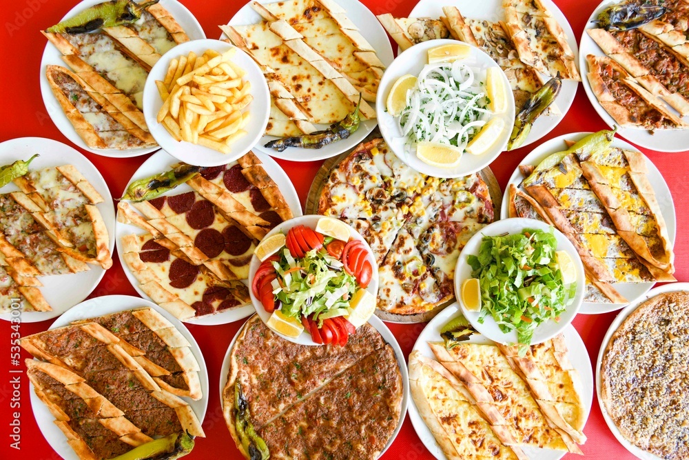 custom made wallpaper toronto digitalDelicious meat kebab with fresh vegetable salad served with variety of Turkish dishes and appetizers. Top view of assorted Turkish food and meze, tasty and healthy Mediterranean cuisine.