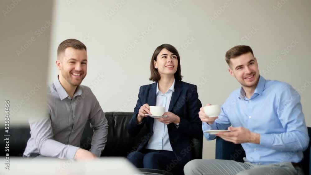 Business colleagues having tea break at work Business colleagues having tea break at work