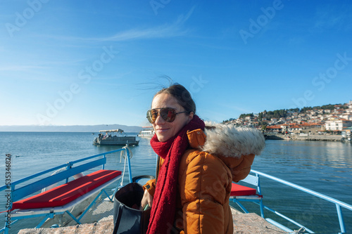 A young woman is enjoying her vacation at Ohrid lake © Milos