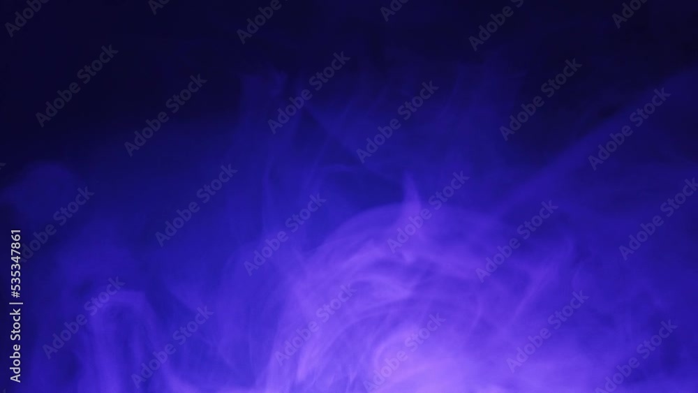 Smoke under color light in the dark. spreading steam. abstract foggy background Smoke under color light in the dark. spreading steam. abstract foggy background