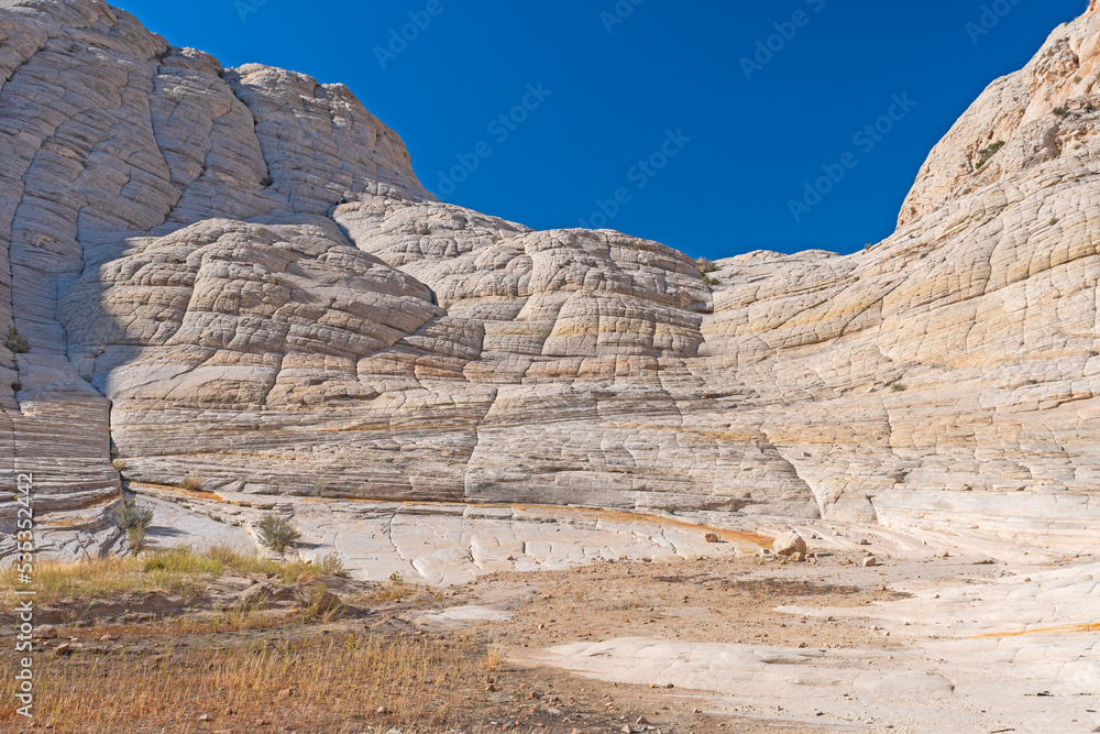 Striated and Eroded Rock in a Sandstone Canyon