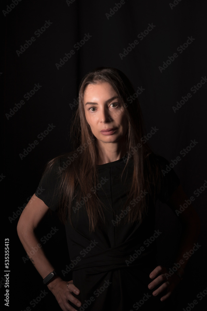 beautiful mature woman dressed in black beautiful mature woman dressed in black