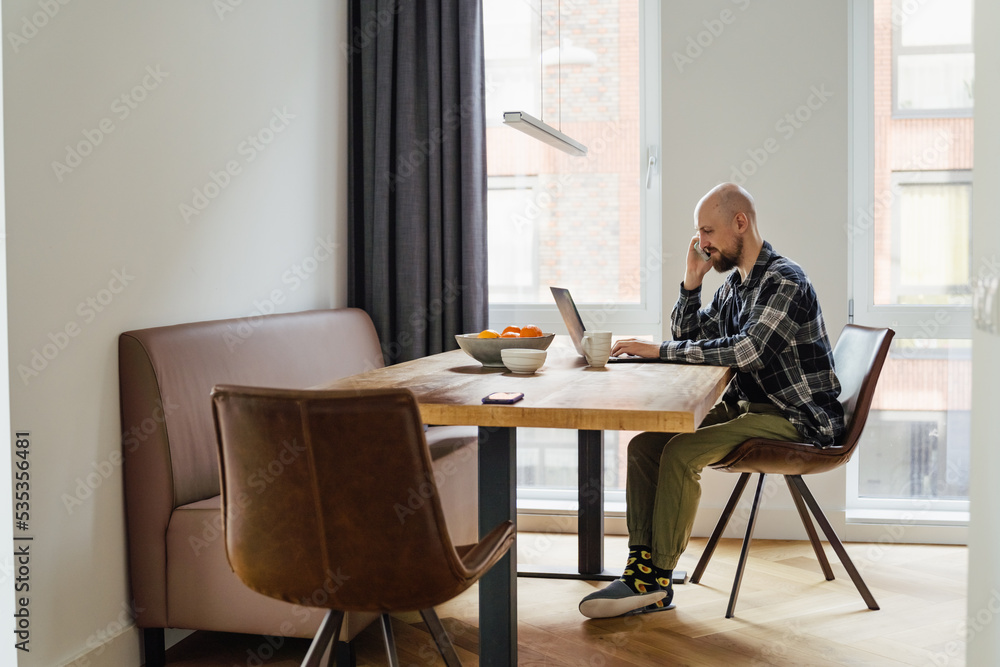 Stay home young man works from home. peoples were advised not to go to the office and work from home Stay home young man works from home. peoples were advised not to go to the office and work from home