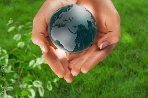ESG Environment, Society and Corporate Governance. Hand with globe