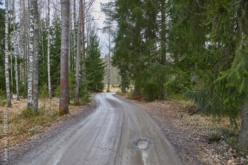 Dirtroad with melting snow photo