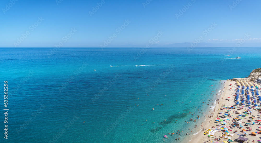 Tropea beach along the Tyrrhenian Sea Coast of Gods (Costa degli Dei). Tropea beautiful resort city of Calabria, southern Italy.
