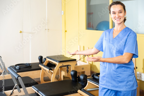 Portrait of benevolent female healthcare professional in the recovery and pilates room
