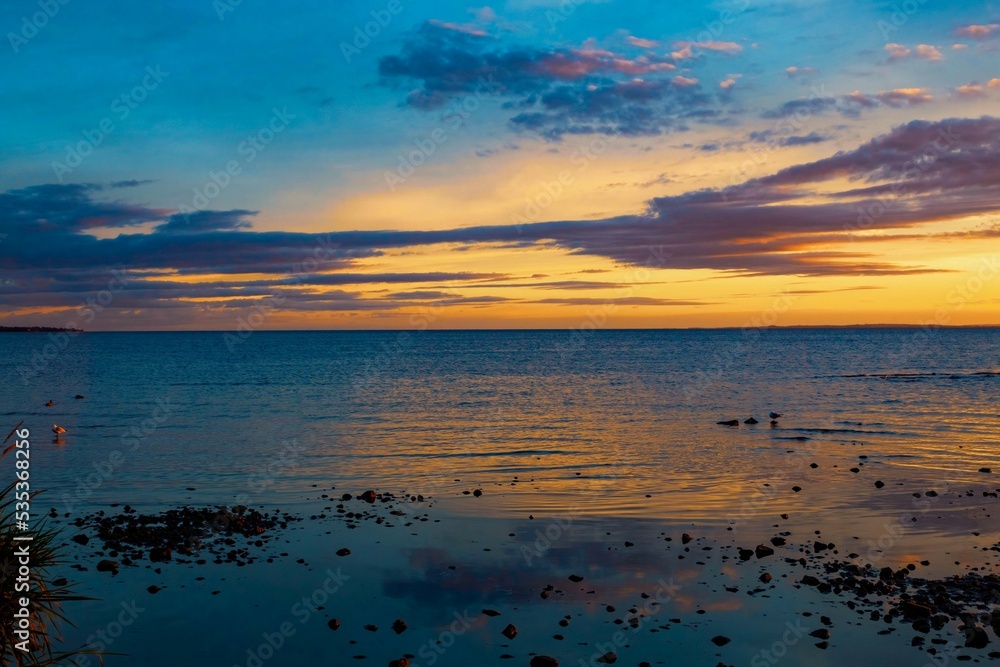 Beautiful Sunset In the Final Moments Of The Golden Hour, Reflecting On The Waters Of Lough Neagh, Northern Ireland